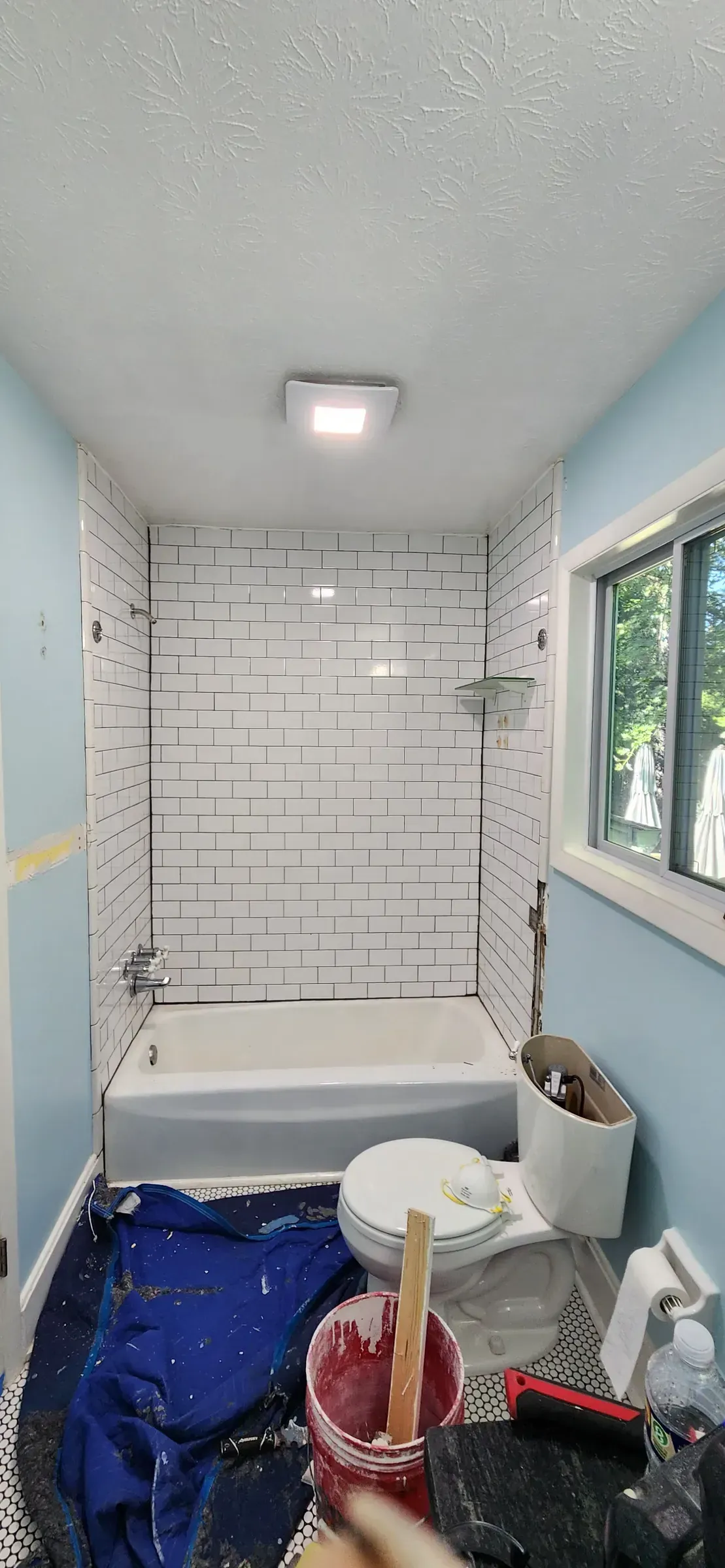 Original subway tile tub surround before conversion
