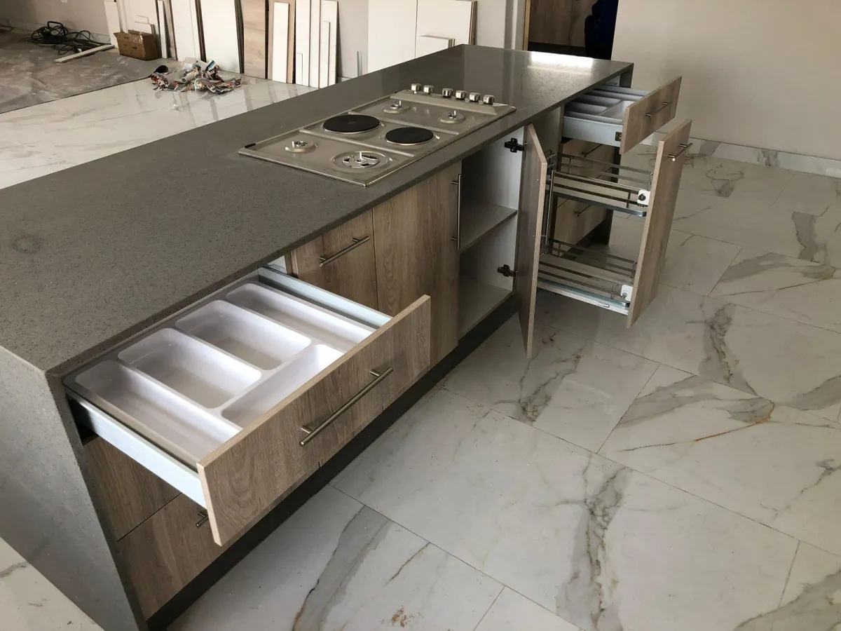 Cupboards featuring soft-close door hinges and gray colored body.