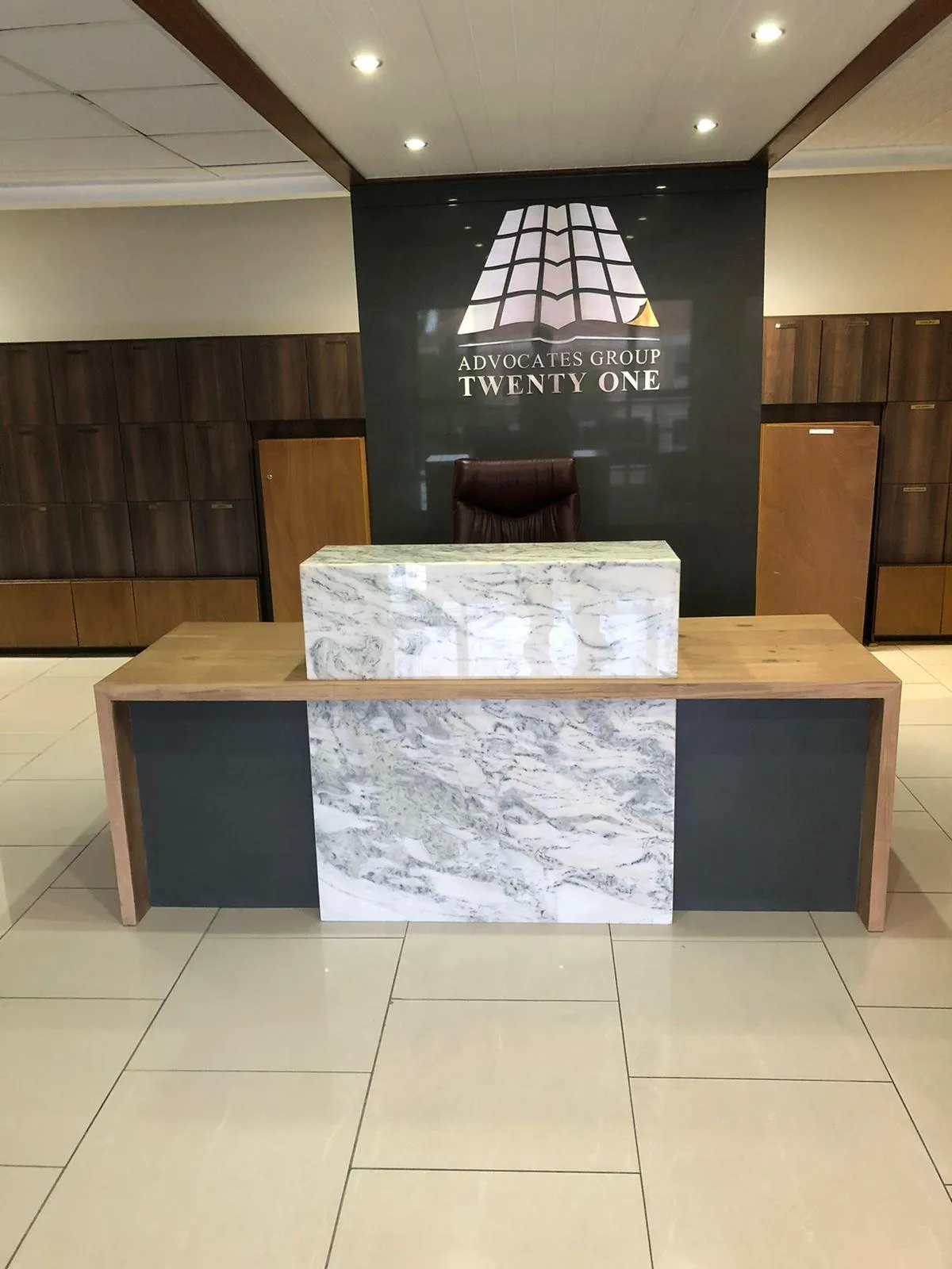 Custom office desk with a built-in quartz finish.