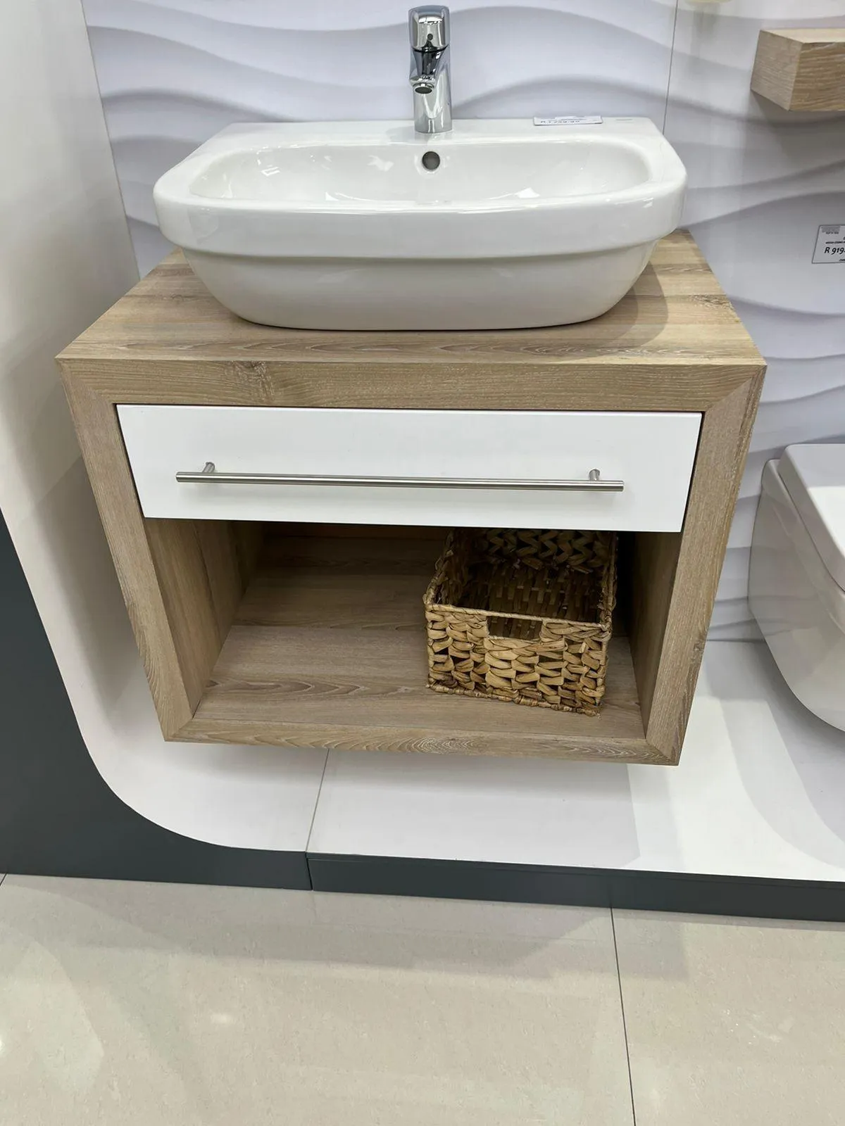 Contemporary bathroom design featuring custom-built floating unit and storage solutions
