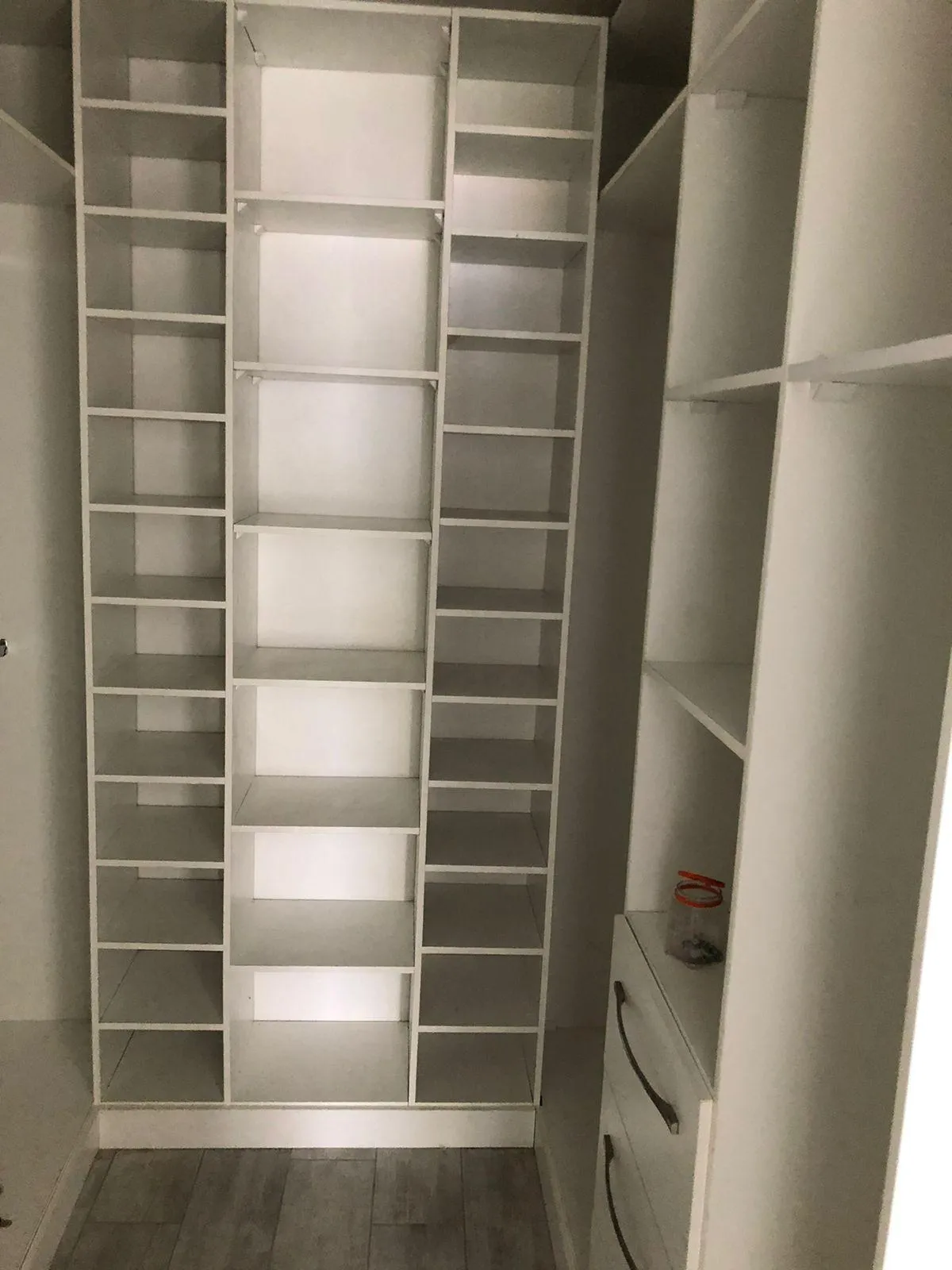 Modern walk-in wardrobe with shoe storage