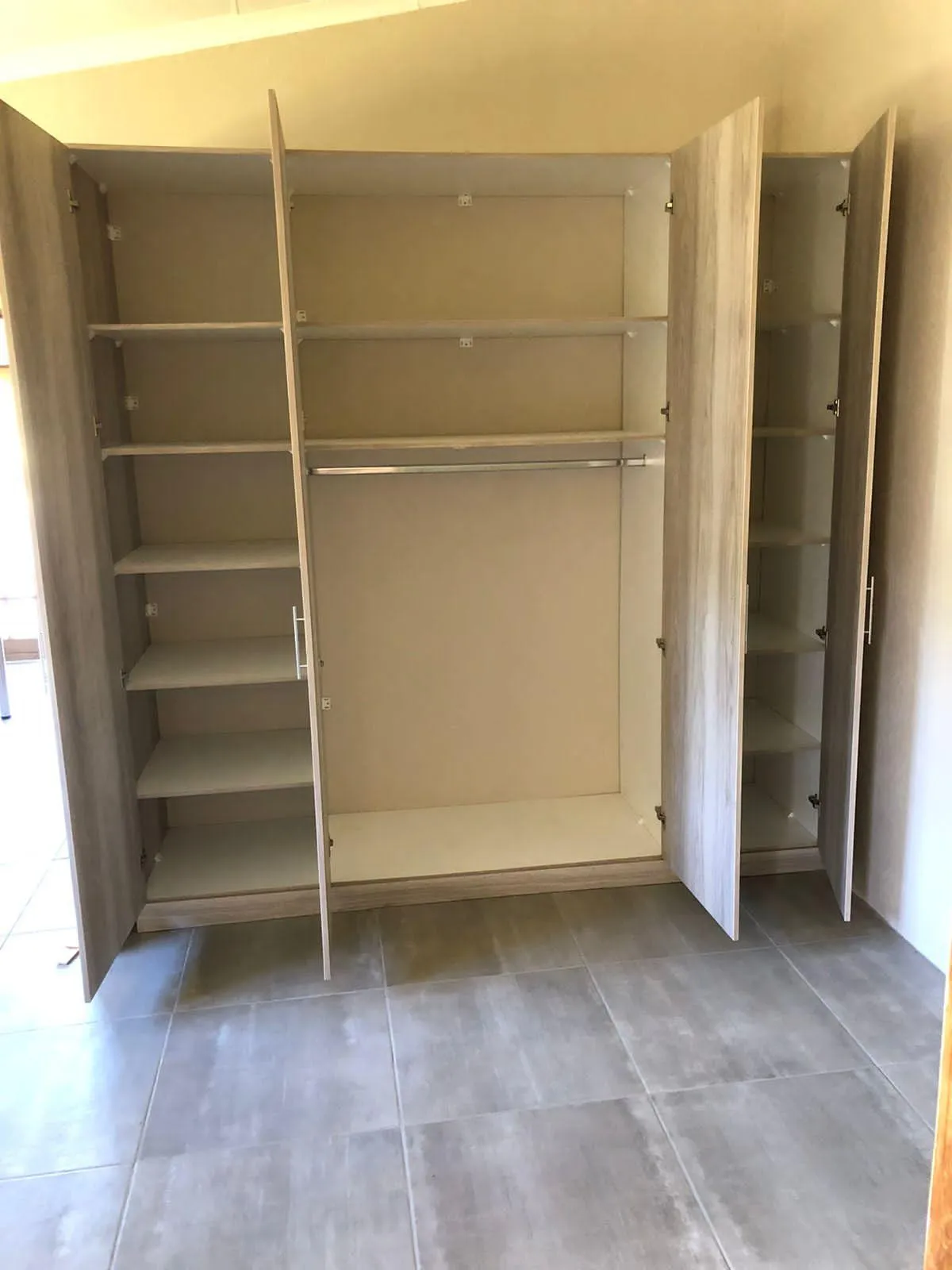 DIY wardrobe with integrated shelving