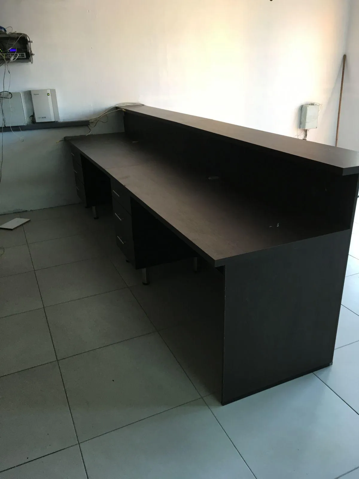Modular office cupboard units with file drawers.