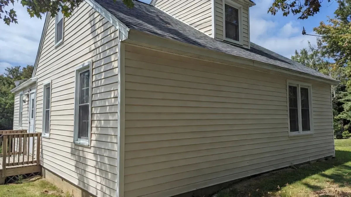 Professional vinyl siding installation on a residential home in Lynn MA, featuring clean, durable exterior panels that enhance curb appeal and long-term weather protection.