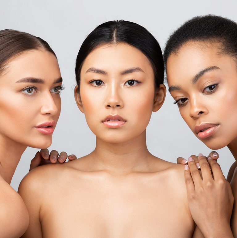 Receptionist, 20s, welcoming, modern clinic, 3:2 aspect ratio