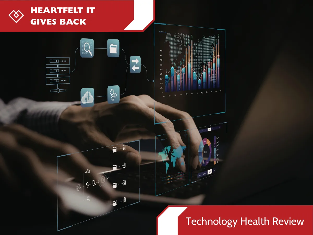 A close-up, dark-toned photograph of a person's hands typing on a laptop, with various holographic data visualizations floating above the keyboard. These visualizations include charts, maps, diagrams, and percentages. A red banner at the top reads "HEARTFELT IT GIVES BACK," and a red box at the bottom is titled "Technology Health Review.