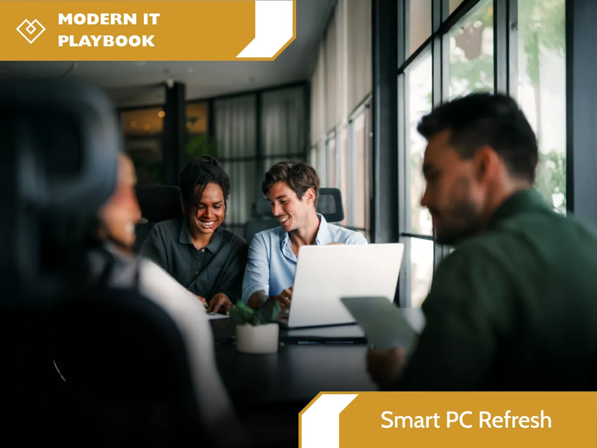 **Alt Text:** Modern IT-themed presentation cover featuring a blurred office meeting scene with four professionals gathered around a laptop in a contemporary workspace with large windows. Gold and white graphic banners frame the design, with the title “MODERN IT PLAYBOOK” displayed in the top-left corner and “Smart PC Refresh” in the bottom-right corner. The overall design has a sleek, professional corporate aesthetic with warm lighting and a collaborative atmosphere.
