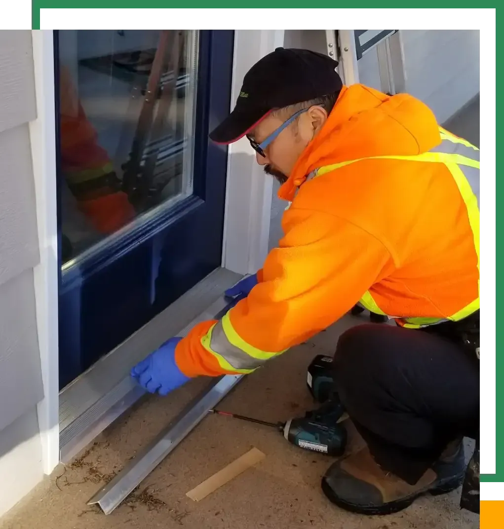 Screenguy Sam during earlier stages of installing a retractable screen door.