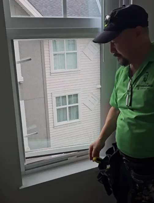 Screenguy Sam showing how smooth the retractable screen works after installation.