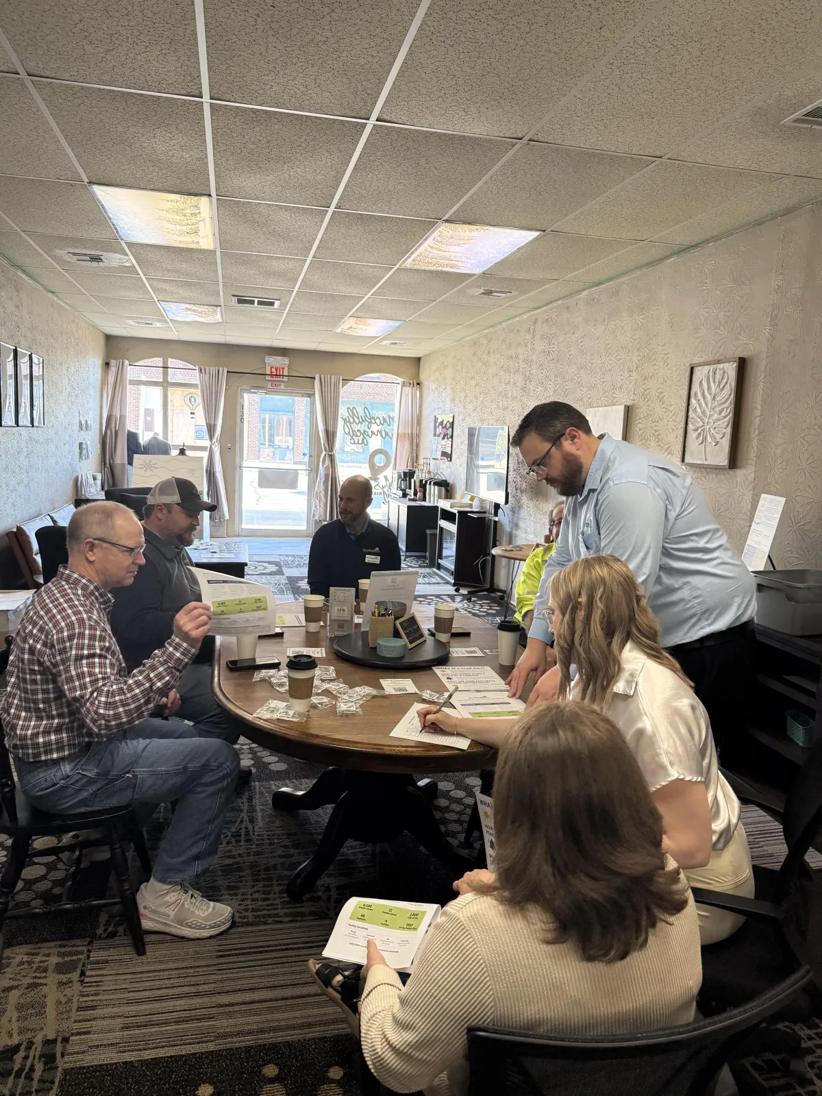 Local business owners gathering for Coffee & Connections networking event