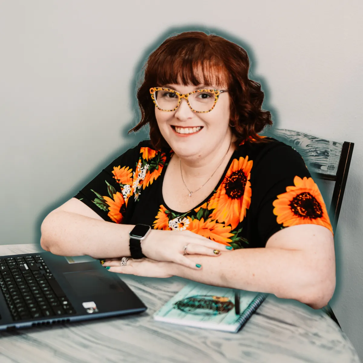 Sara Comer smiling in a warm, inviting setting, ready for a discovery call.