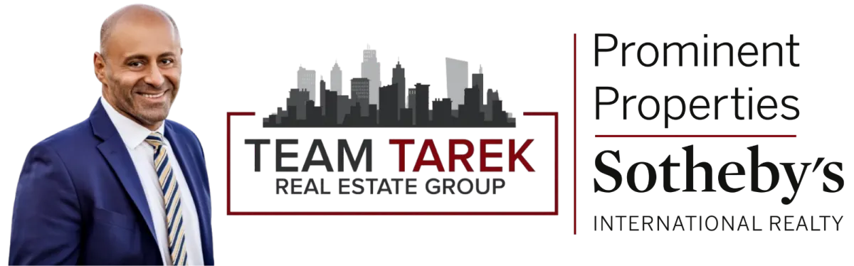 Tarek Hassieb smiling in a blue suit, promoting "Team Tarek Sells Homes" alongside the Liberty Realty logo, emphasizing local real estate expertise in Hoboken, NJ.