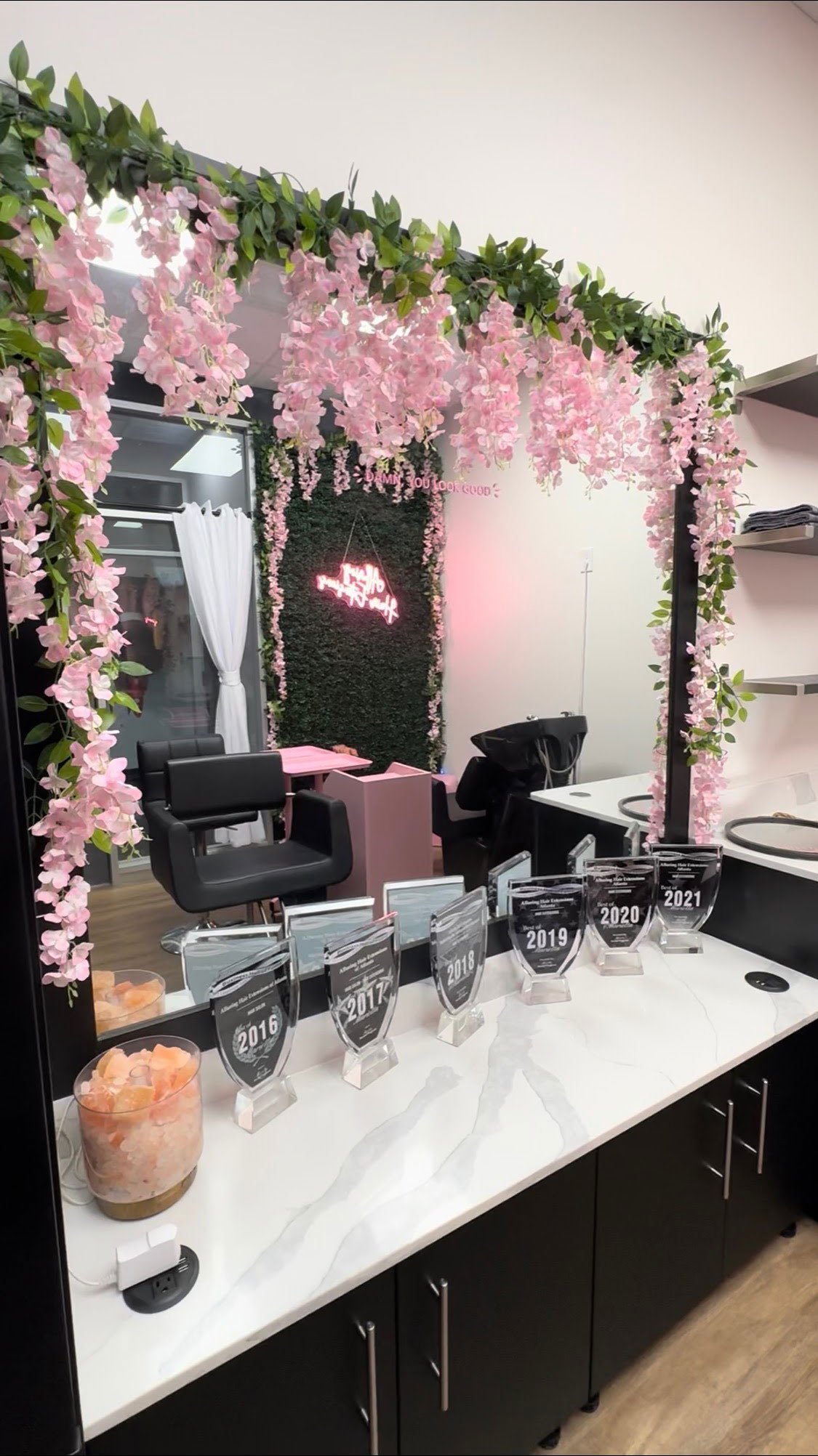 a store front window with asian writing on it