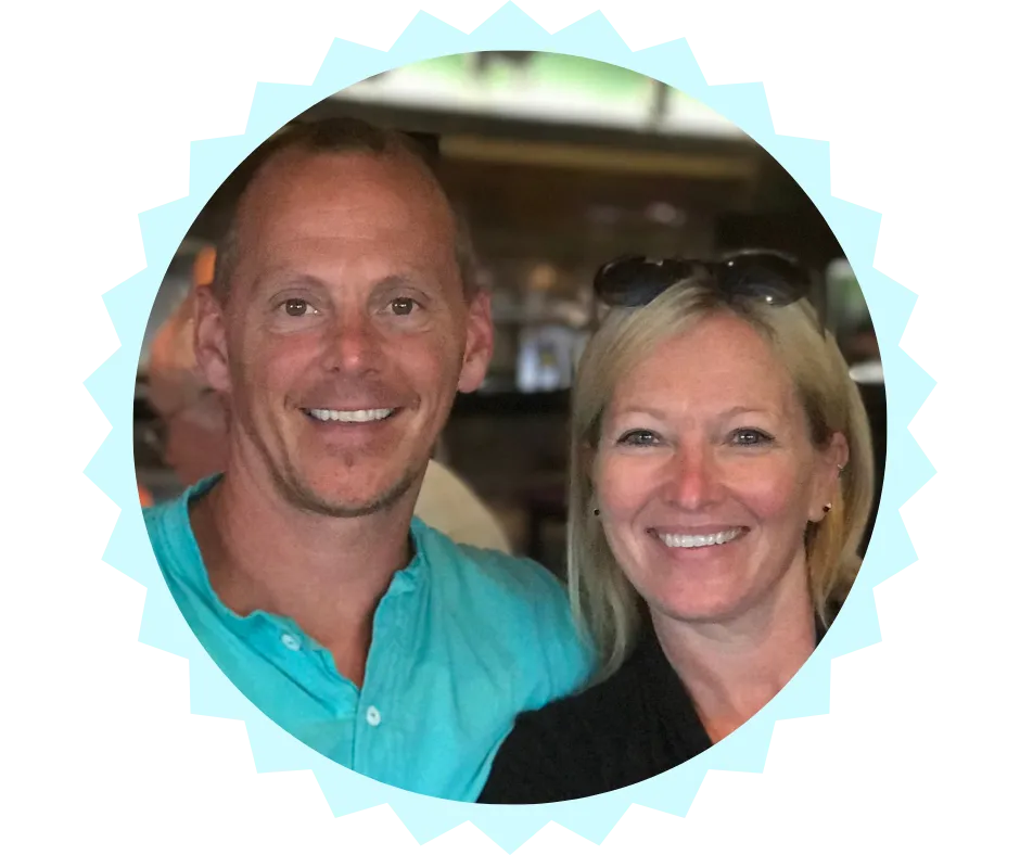 Photo of David Helton and Tammy Helton, owners of Three Springs Campground and RV Park. David is wearing a turquoise shirt, and Tammy is wearing sunglasses on her head and a black top. They are smiling warmly in a casual indoor setting.