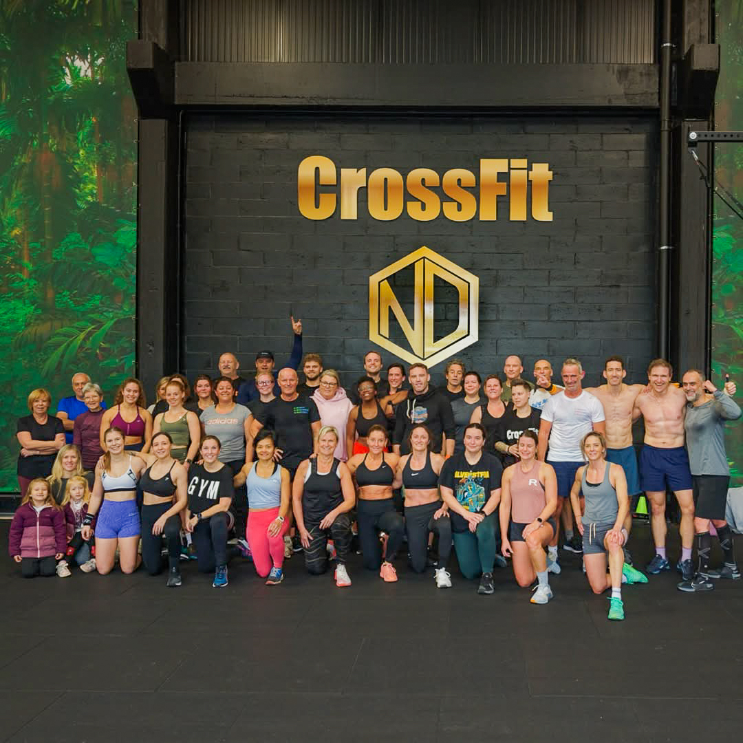 Leden van Non Deficiere tijdens uitdagende CrossFit WOD in Hasselt
