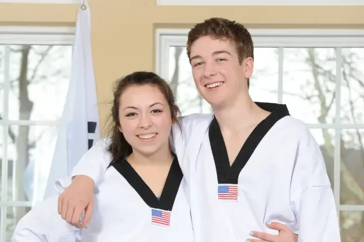 teens having fun practicing martial arts