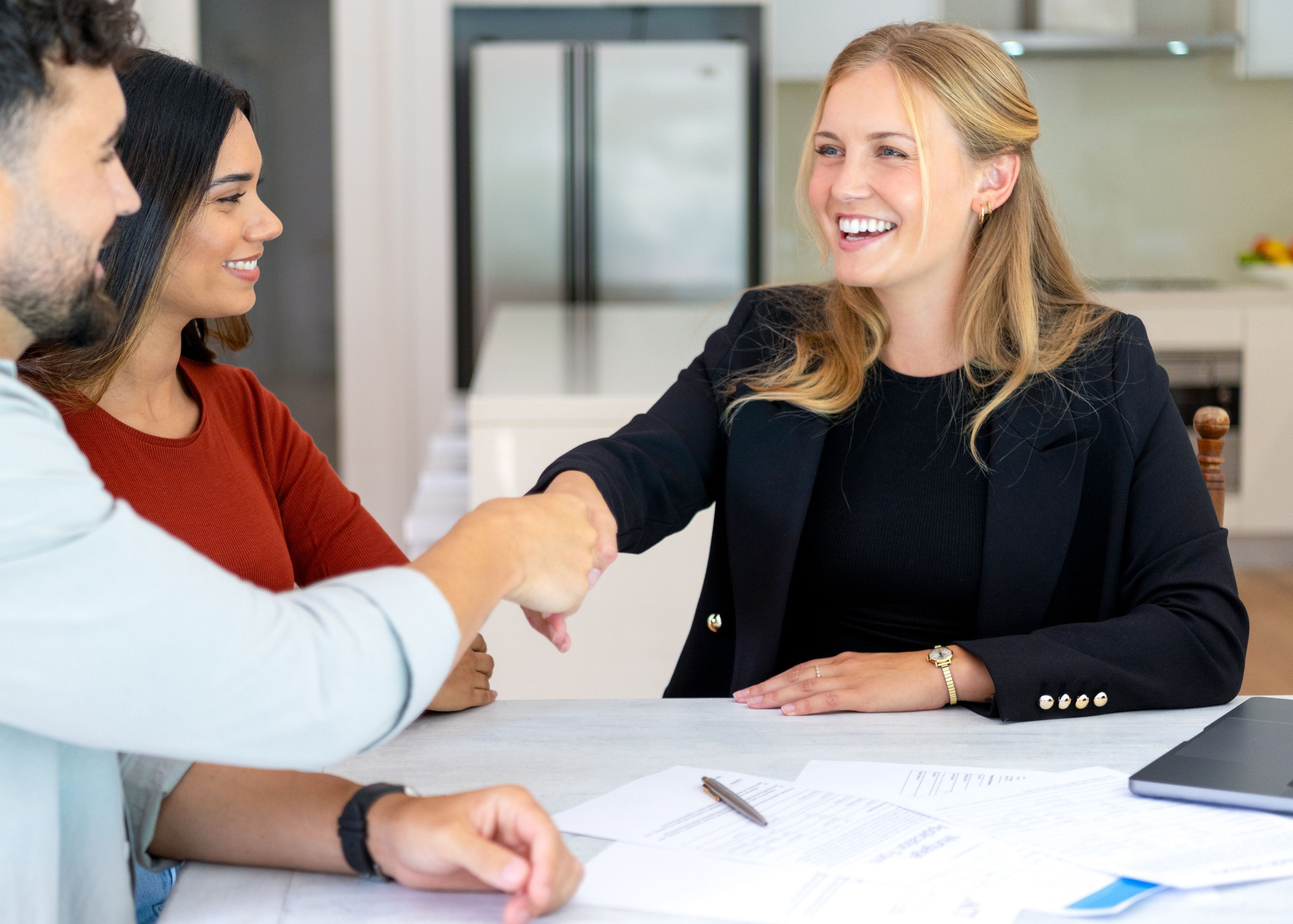 Property manager meeting with landlord signing a new lease