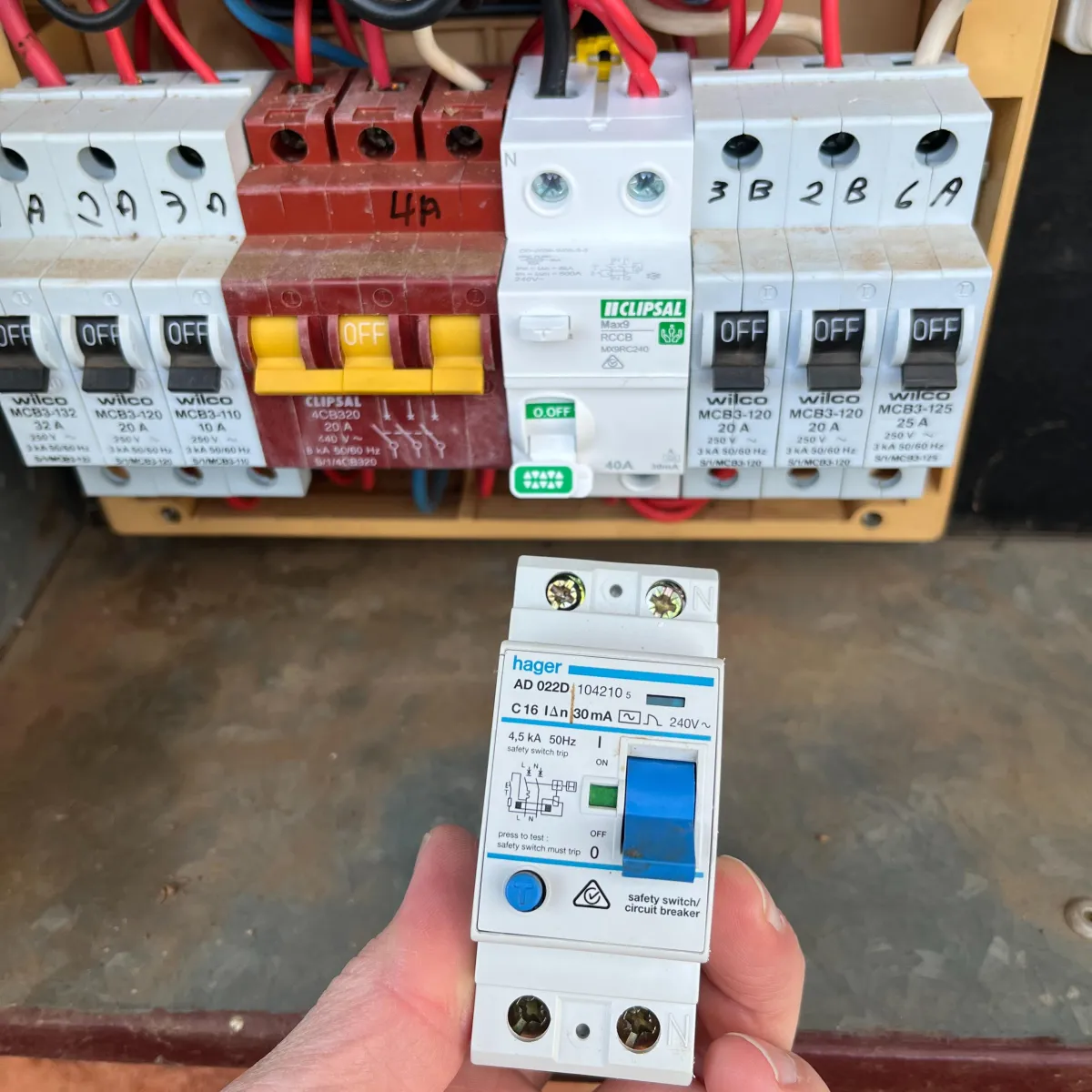 1010 Safety & Electrical licensed electrician replacing a faulty RCD safety switch in a switchboard for a Dubbo rental property