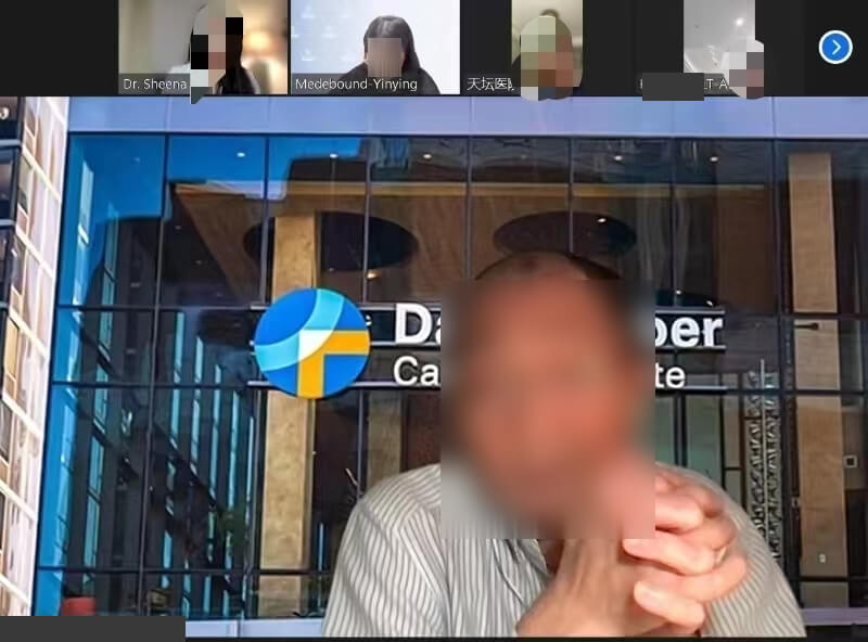 MD Anderson doctors video speaking with patient