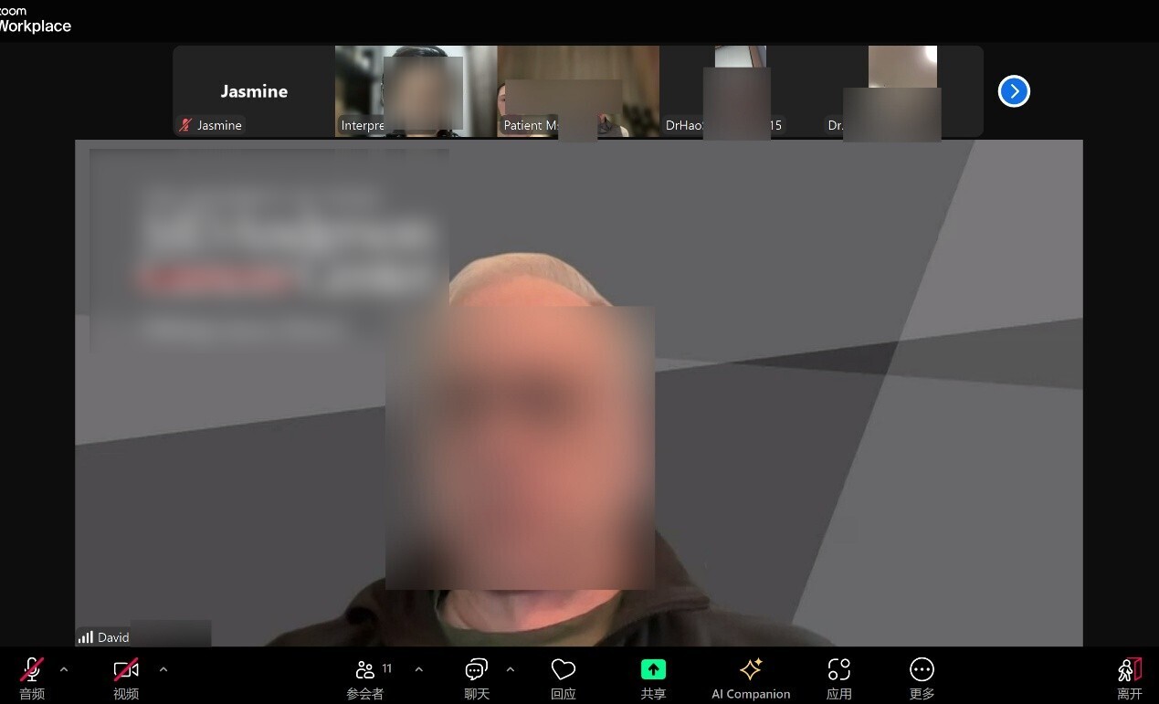 MD Anderson doctors video speaking with patient