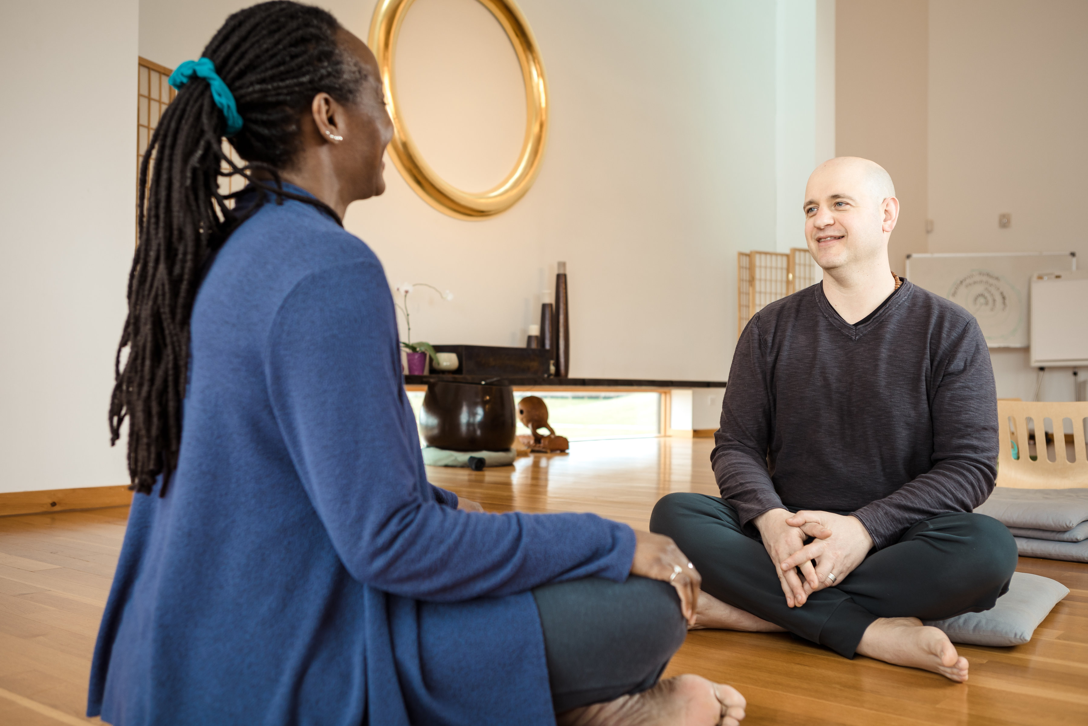 woman lying on grass field