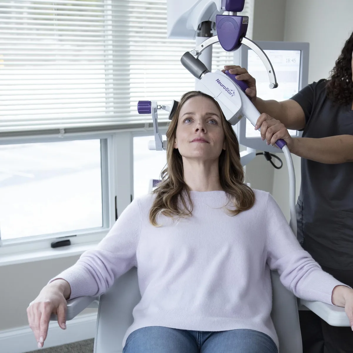 a body of water surrounded by trees and grass