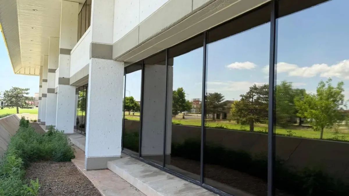 Clean commercial building windows in Oklahoma City showcasing professional window cleaning results - Suds Monkey Window Cleaning services