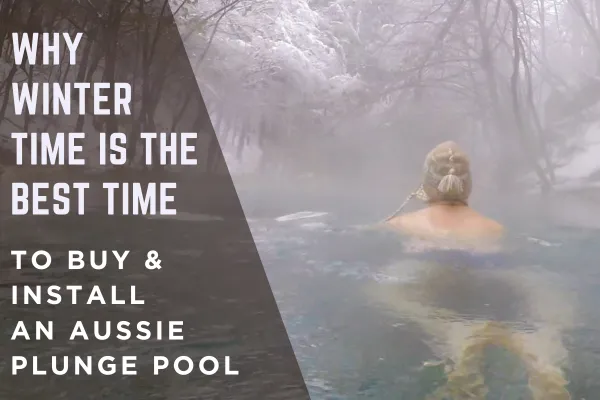 person swimming in plunge pool in winter