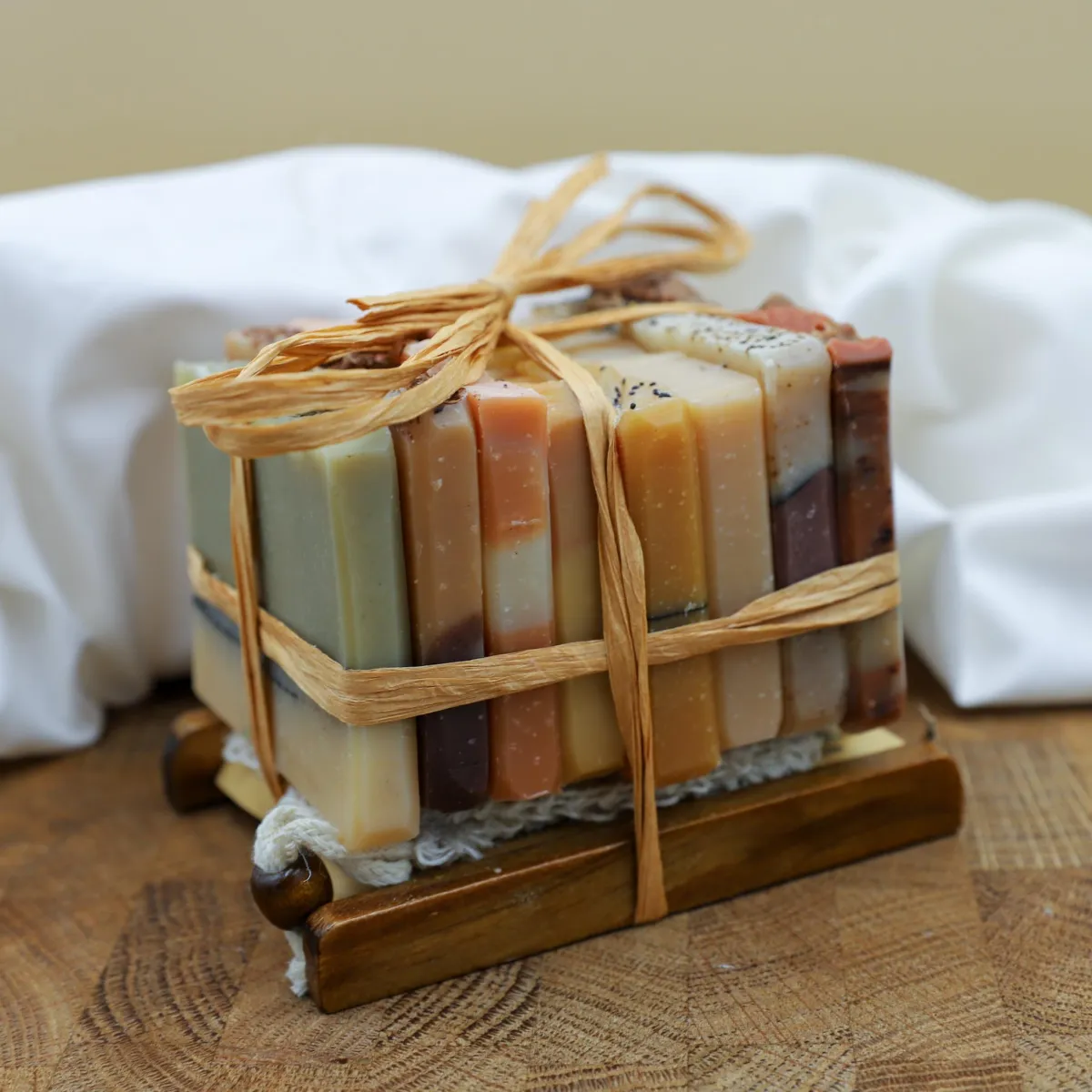 A close up of three makeup brushes on a table