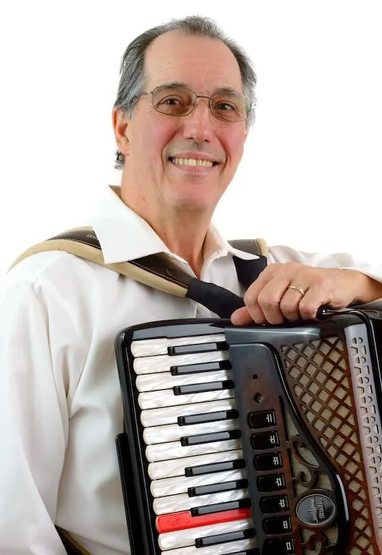 Adult student learning to play accordion at Accordion Life Academy