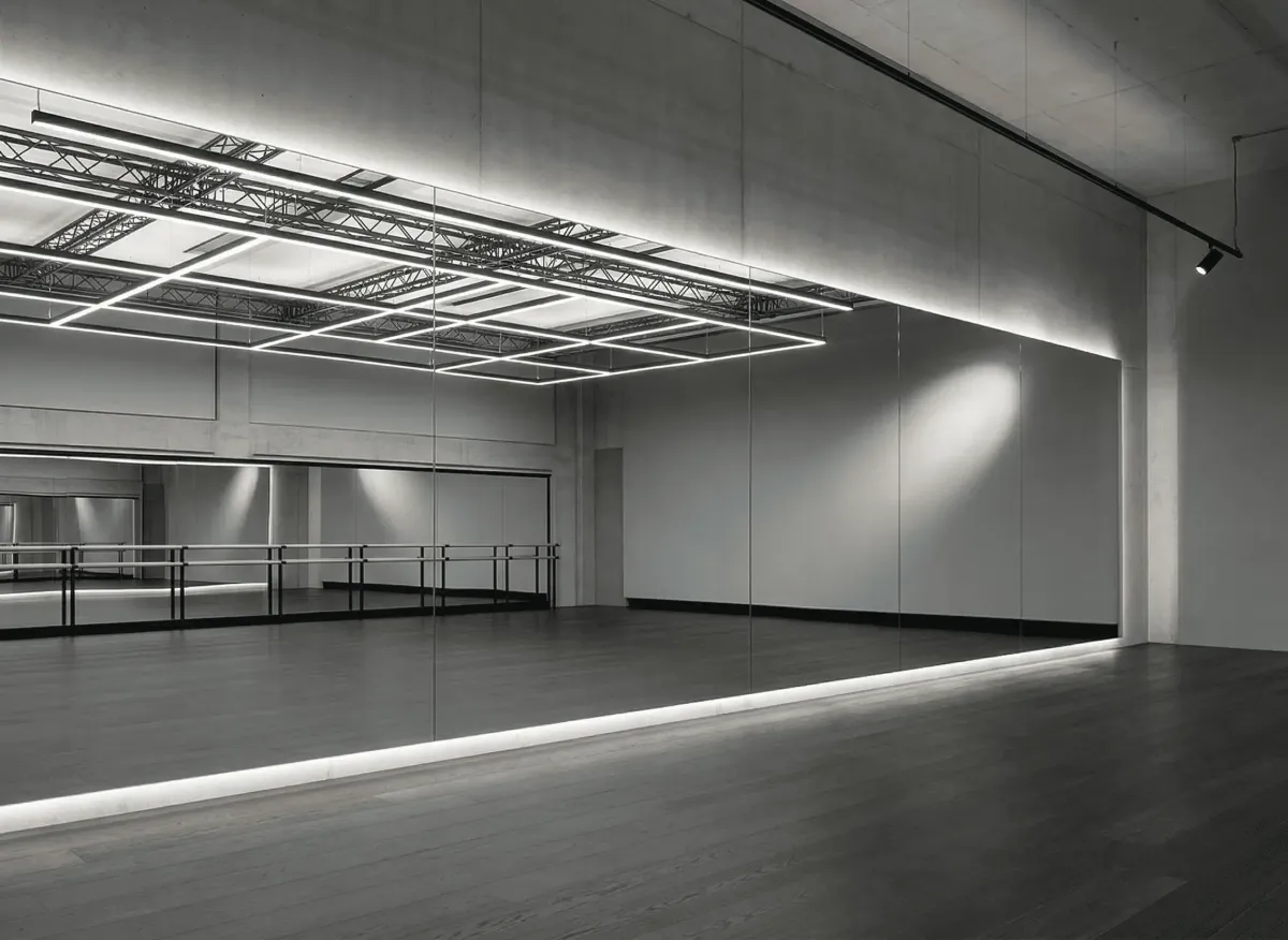Final quality testing of dance studio mirrors to ensure high-definition clarity and perfect lighting