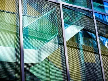 Custom interior glass handrailing for luxury residential staircases in Naples