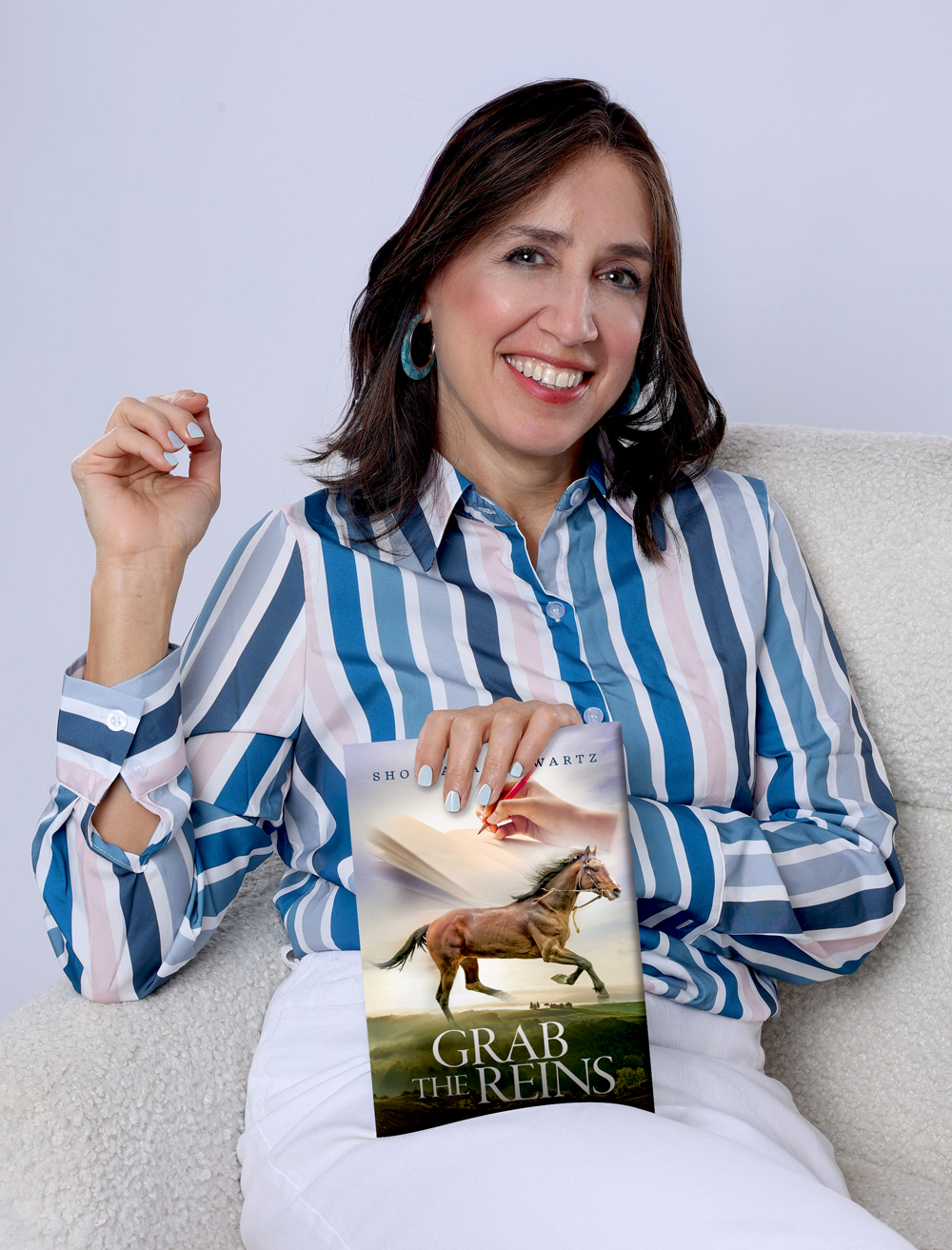 Portrait of Shoshana Schwartz with book Grab the Reins
