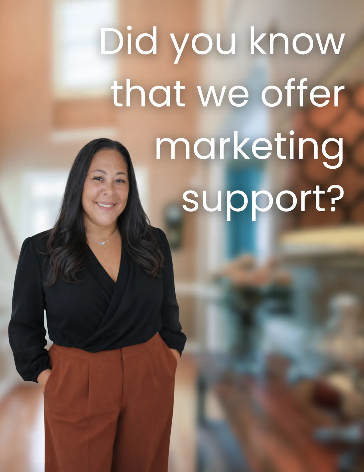 A group of seasoned title professionals in business attire, gathered around a large table with legal documents and laptops, engaged in a focused discussion, set in a sophisticated office with shelves of reference books and certificates.