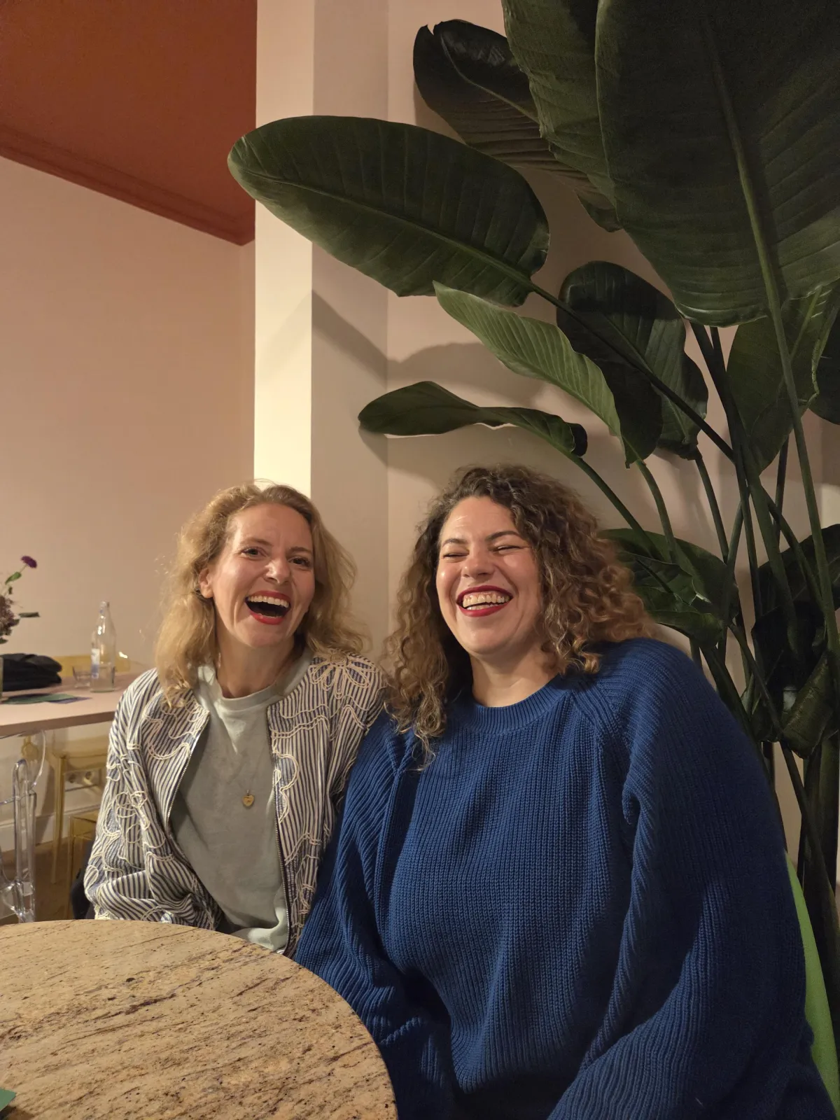 man in orange shirt looking at the sky during daytime