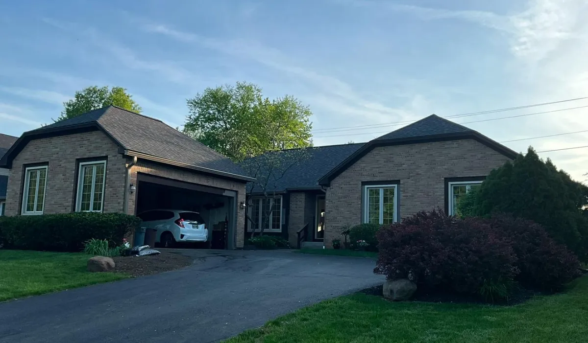 Image of large single story home with new gutters