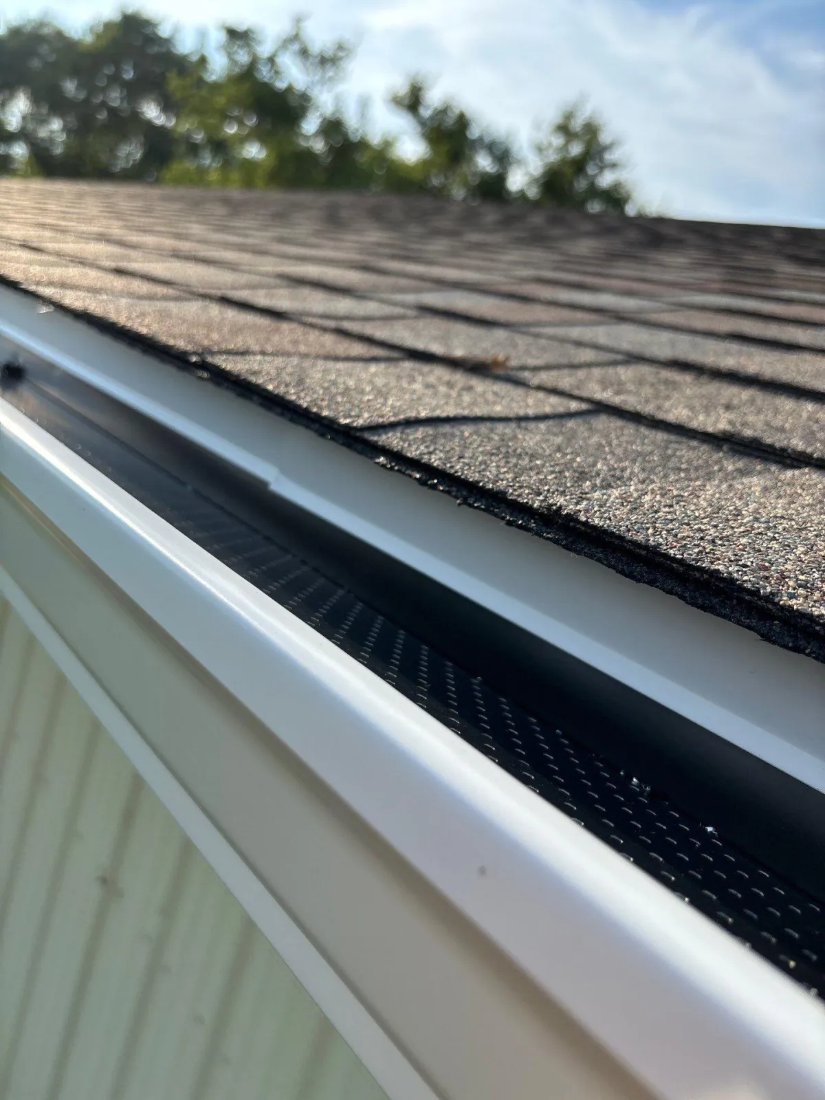 Multi-story home with new gutters installed