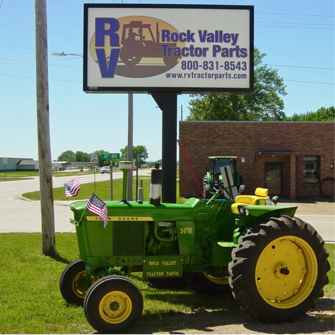 Rock Valley Tactor Parts Sign and Restored John Deere Tactor