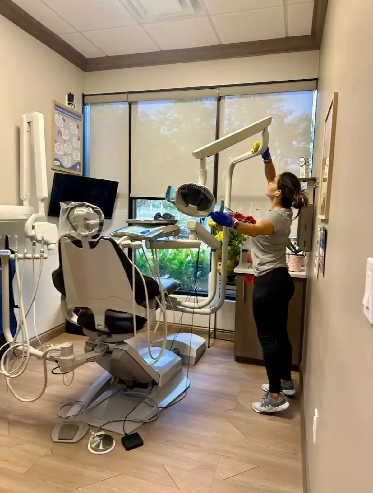 Puroshine staff disinfecting dental office high-touch areas