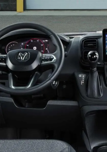Dark moody steering wheel dashboard delivery van