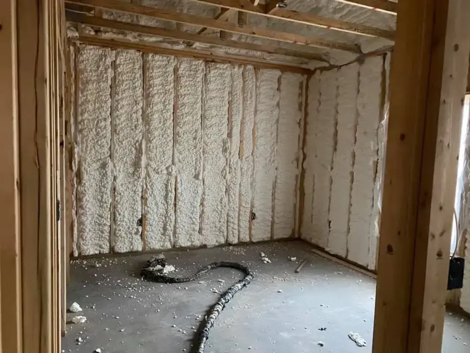 Open-cell spray foam applied to exterior wall in Destin FL by Blue Line Insulation