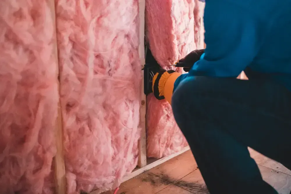 Roll of fiberglass insulation representing Blue Line Insulation's trusted service in Panama City FL