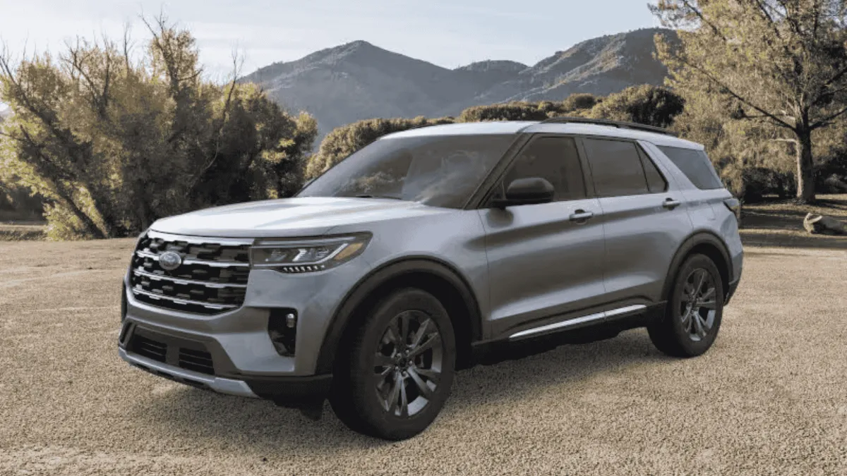 Photo of a Ford Explorer with mountains in the background
