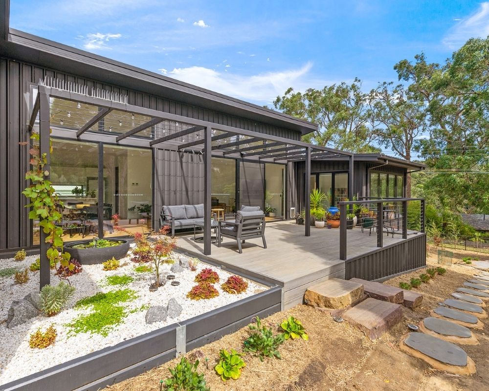 Timber deck extension connecting indoor and outdoor living