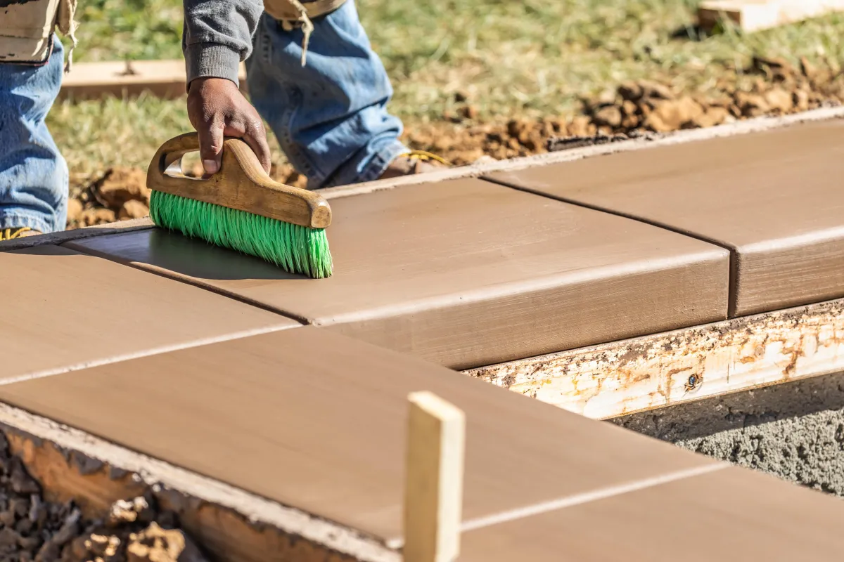 Parker Built Construction crew installing a wooden fence panel for a residential property