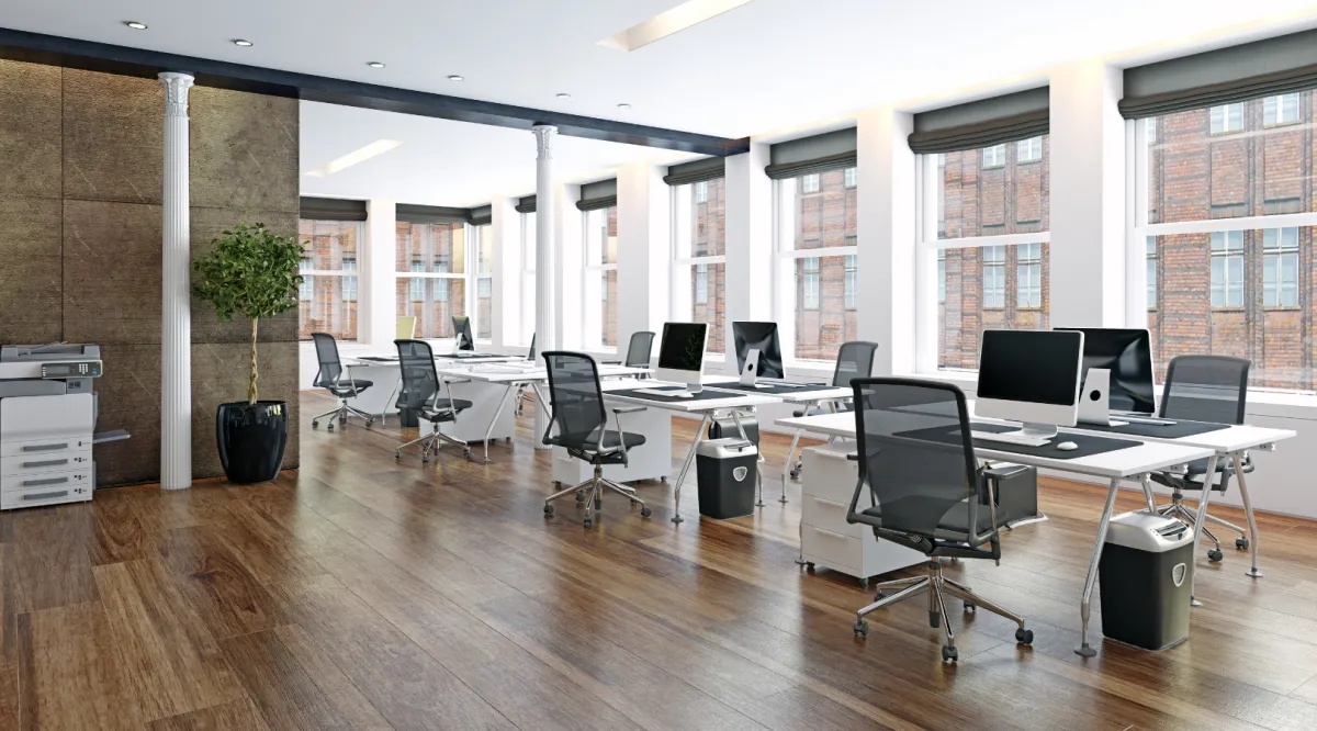 Modern commercial office space with open layout, workstations, and natural light built by Dream Design Building Group Jacksonville Florida