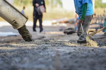 barbed wire concrete laying