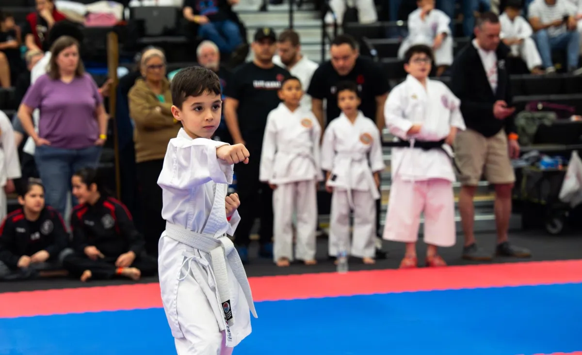 two men dueling inside room