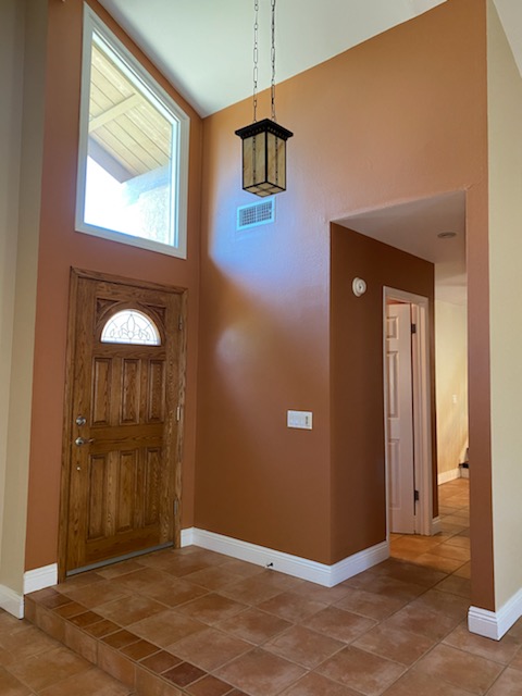 Updated kitchen with freshly painted white cabinets