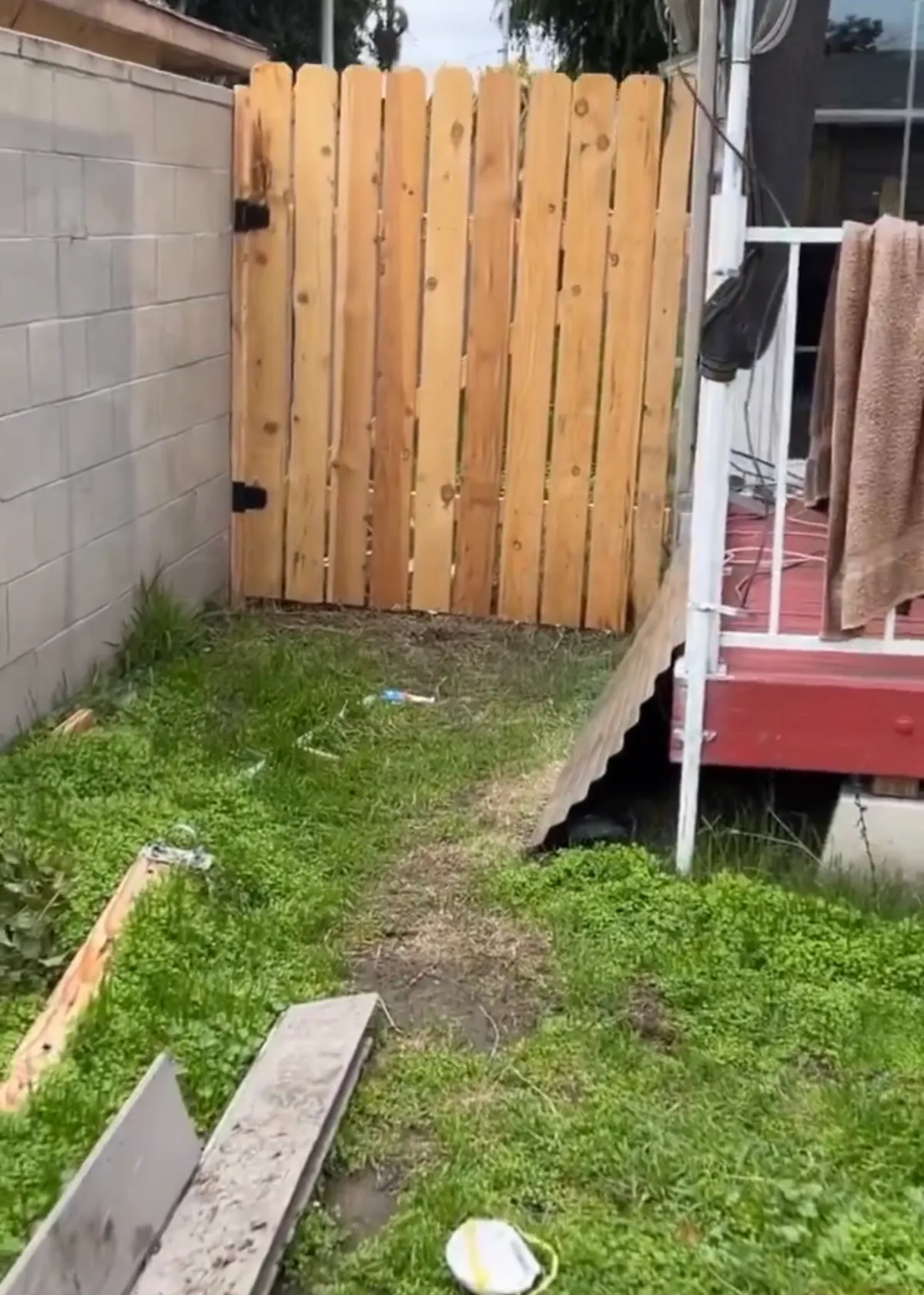 Exterior house repainted with blue siding and white trim